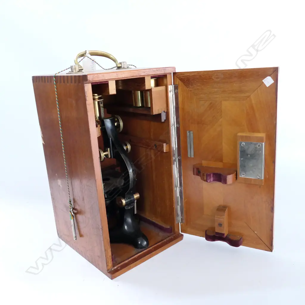 ERNEST LEITZ, WETZLER MICROSCOPE No.105503, w EBONIZED STIRRUP FOOT, CURVED LIMB, CONDENSER. MIRROR ABSENT. IN MAHOG BOX Image 1++